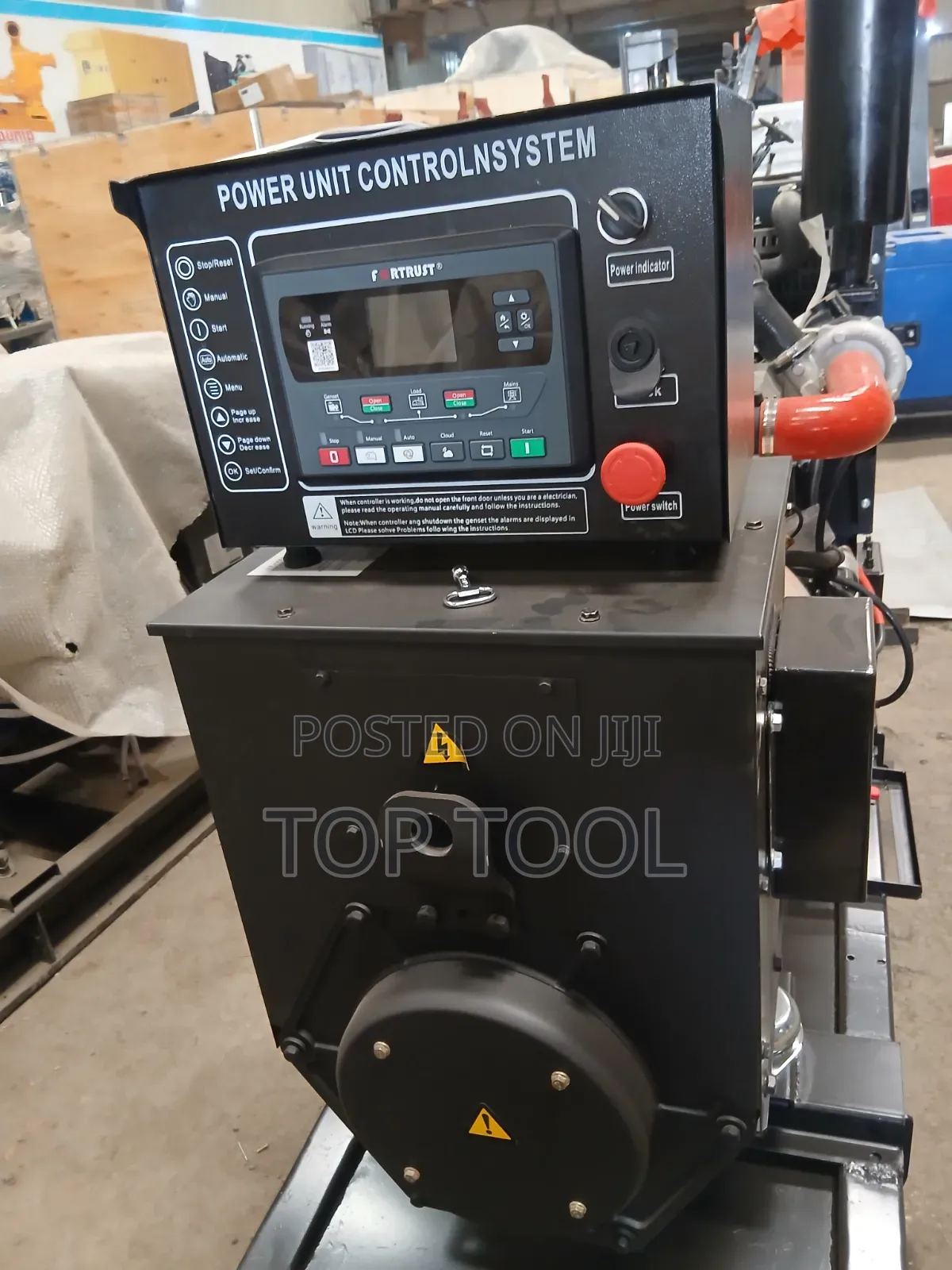 ,Industrial Diesel Generator Set Mounted on a Black Steel Skid Frame.
