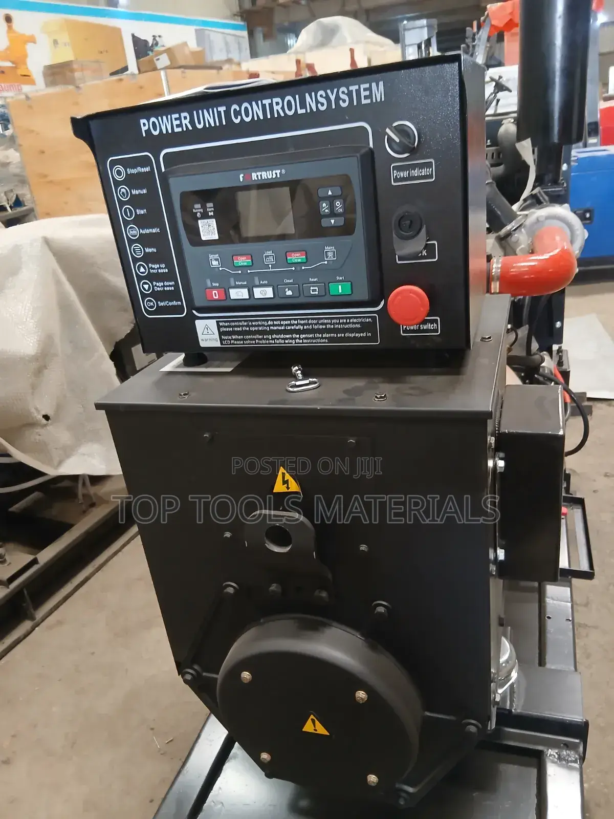 ,Industrial Diesel Generator Set Mounted on a Black Steel Skid Frame.