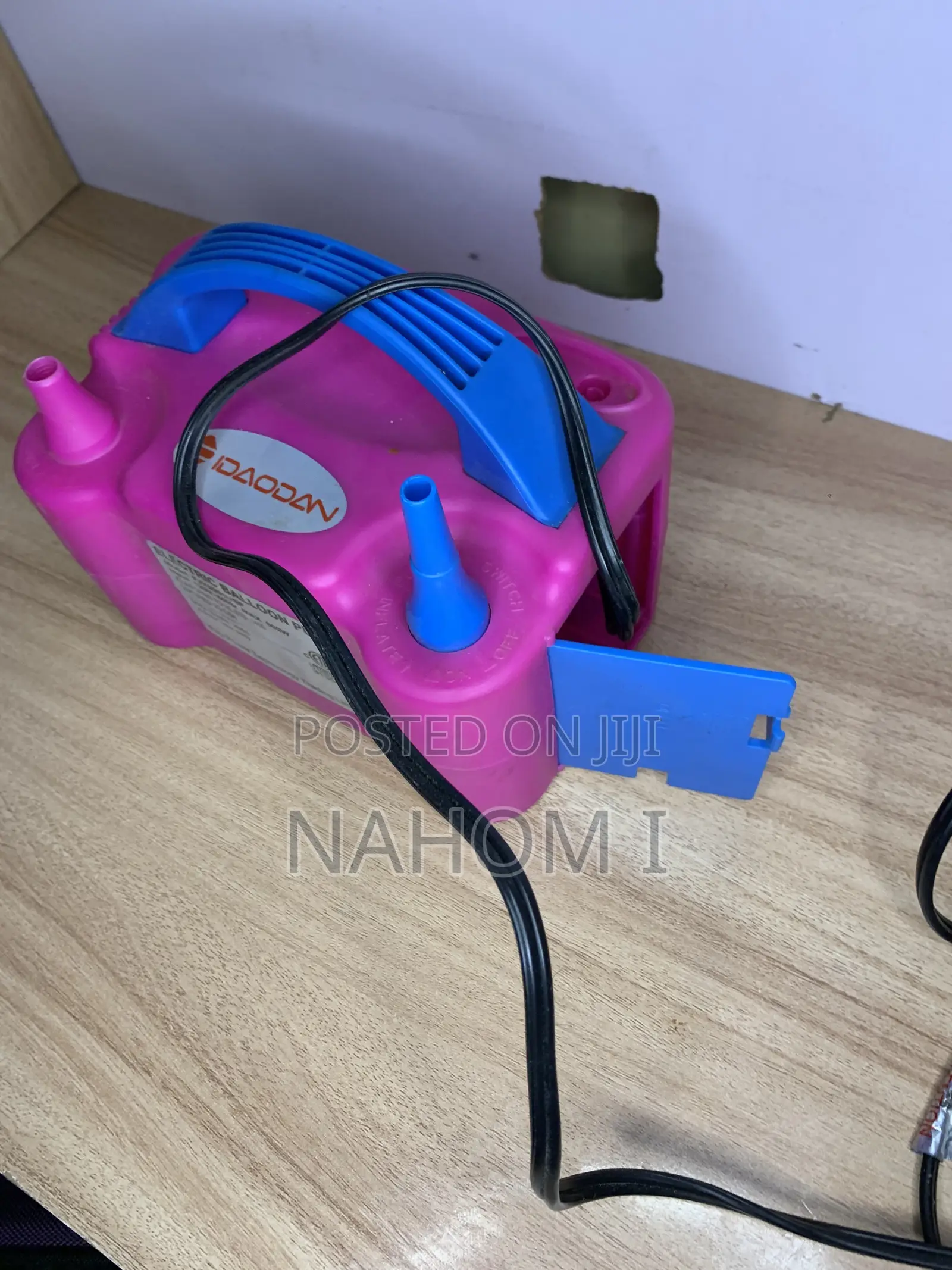 This Is an IDAODAN Portable Dual-Nozzle Electric Balloon Pump in Pink
