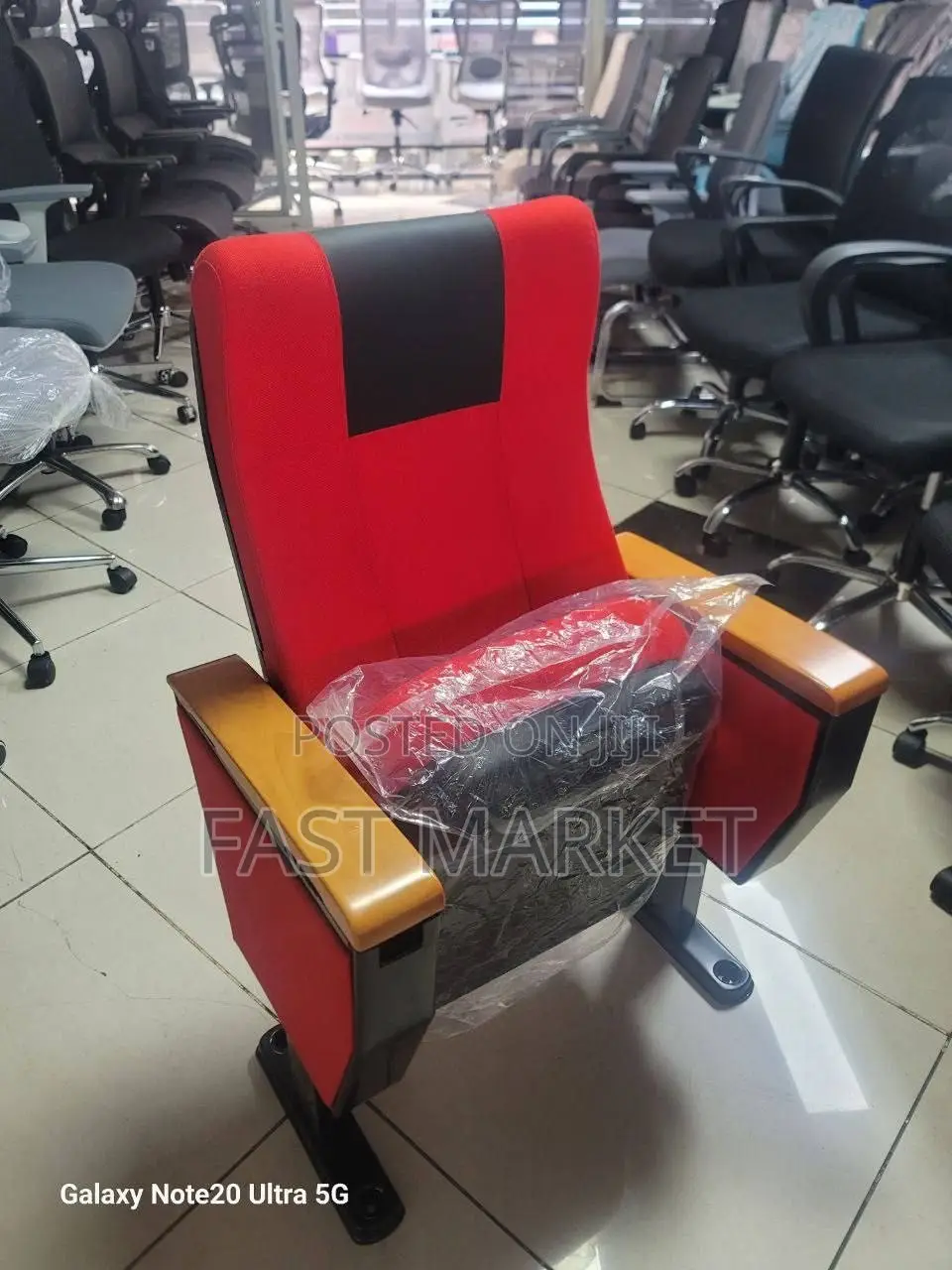 Cinema Chair Featuring Wooden Armrests and a Tip-Up Seat