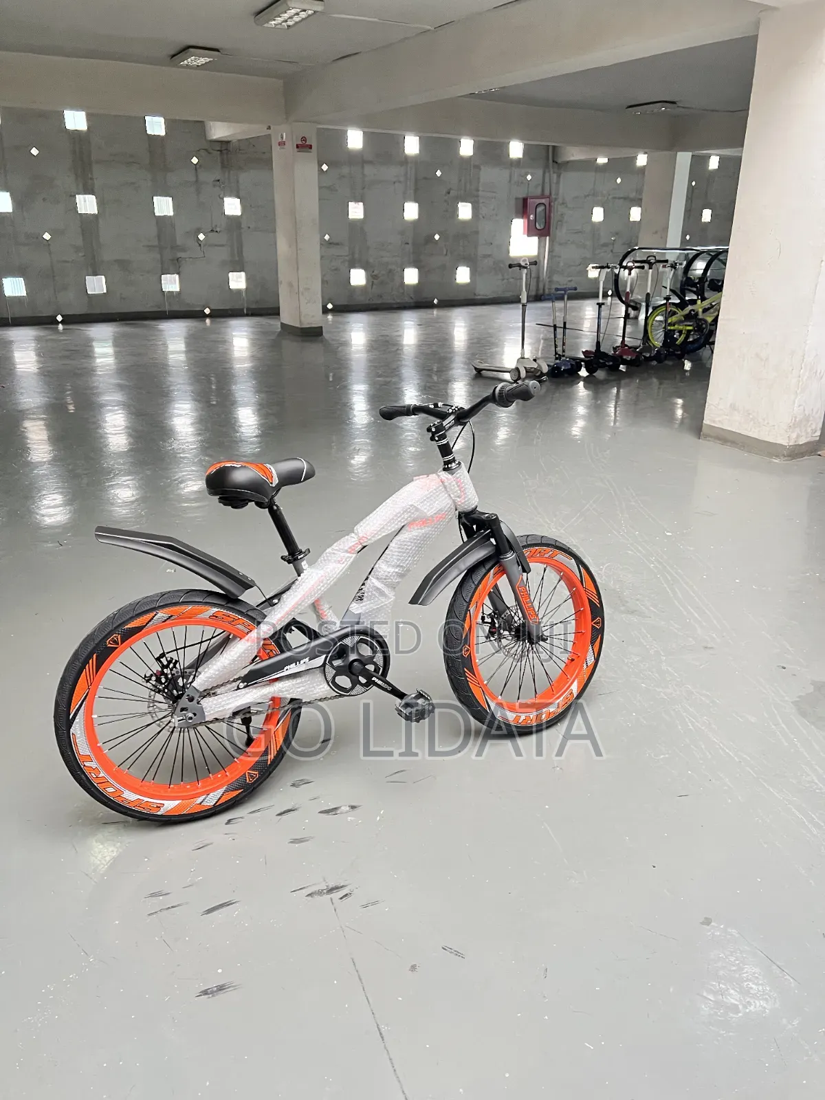ቆንጆ ጥቁርና ብርቱካናማ ሳይክል — Stylish Black Orange Bike