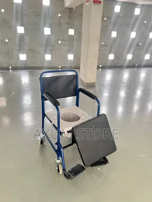 12. Commode Chair With Footrests
ከእግር መደገፊያ ጋር የኮሞድ ወንበር