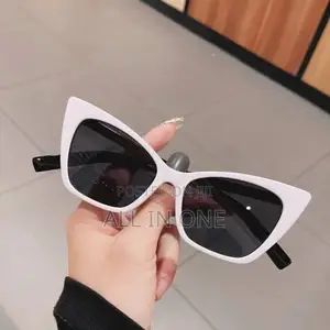 White Cat-Eye Sunglasses Featuring Dark Tinted Lenses