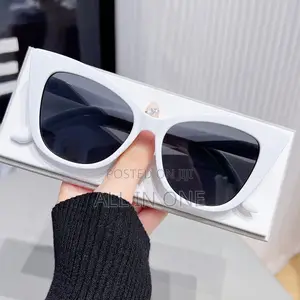 White Cat-Eye Sunglasses Featuring Dark Tinted Lenses