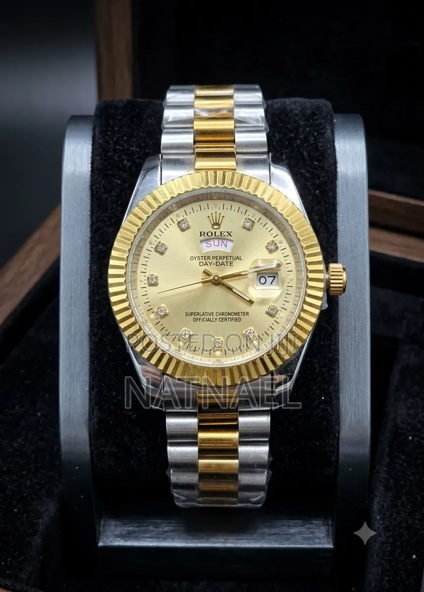 Rolex Oyster Perpetual Golden and Silver Colors