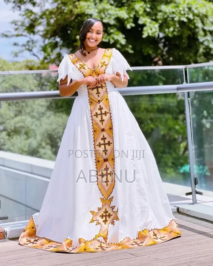 Elegant Ethiopian Habesha Kemis – White Gold Traditional Dress