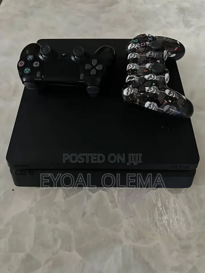 PS4 Slim + 2 Joysticks + Games (Ghost of Tsushima, RDR2, GTA 5)