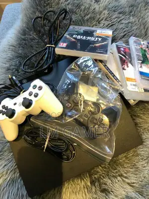 Ps3 Slim With Alot of Game