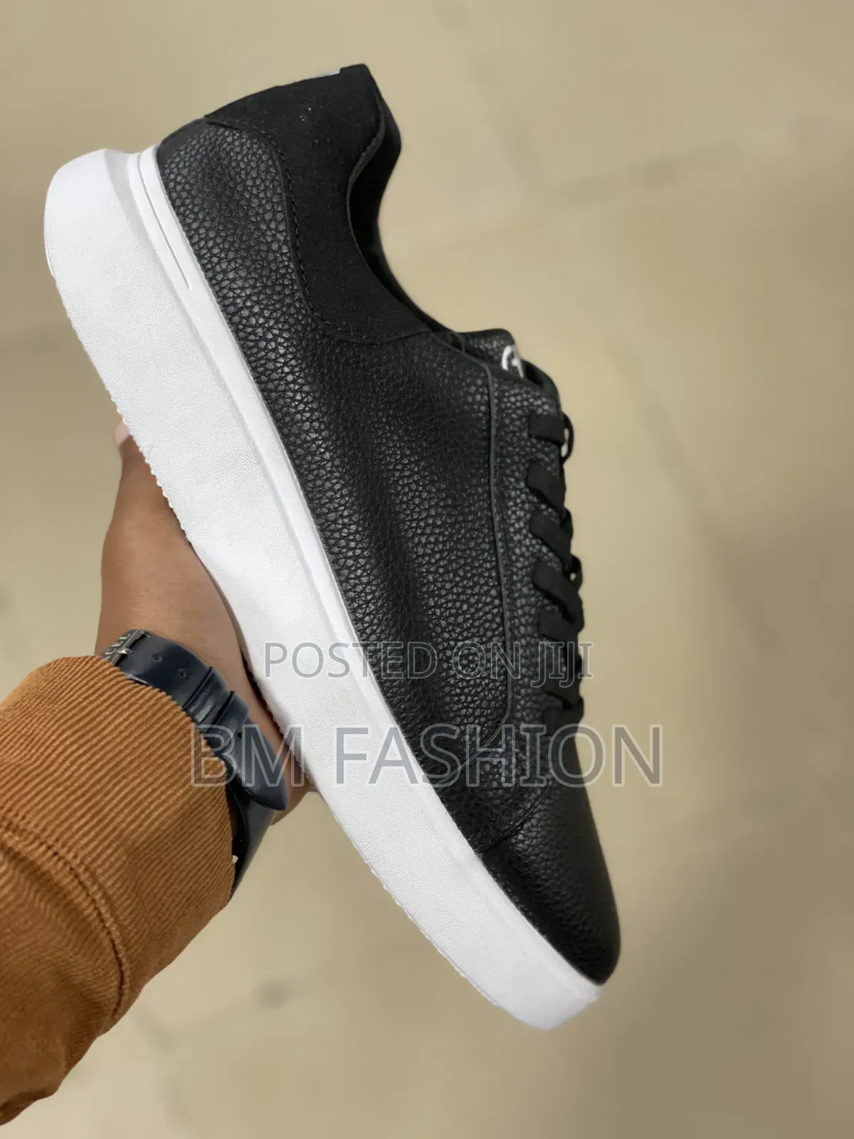 Sleek Black Tumbled-Leather Cole Haan Casual Sneaker