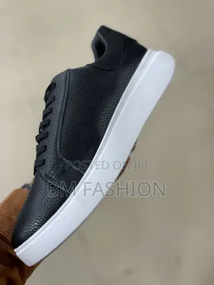 Sleek Black Tumbled-Leather Cole Haan Casual Sneaker