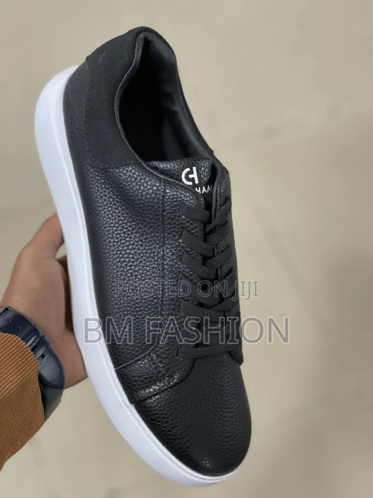 Sleek Black Tumbled-Leather Cole Haan Casual Sneaker
