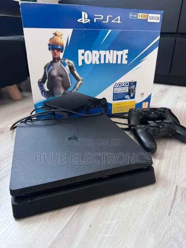PlayStation 4 Slim + Two Original Controllers