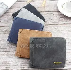 Wallet in a Dark Grey Finish With Visible Vertical Stitching Detail.