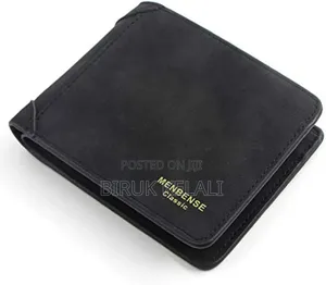 Wallet in a Dark Grey Finish With Visible Vertical Stitching Detail.