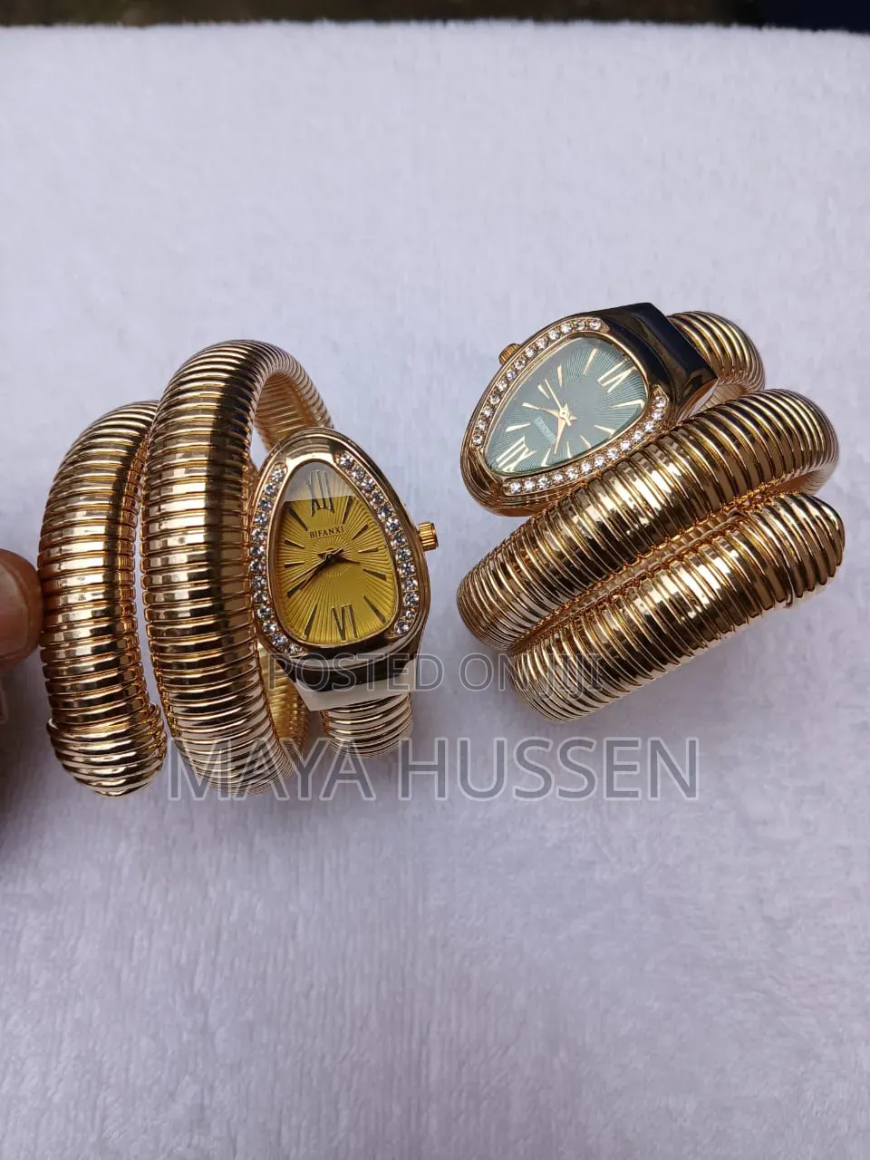 Snake Coil Gold Watch With Crystal Bezel
3. Description (መግለጫ)