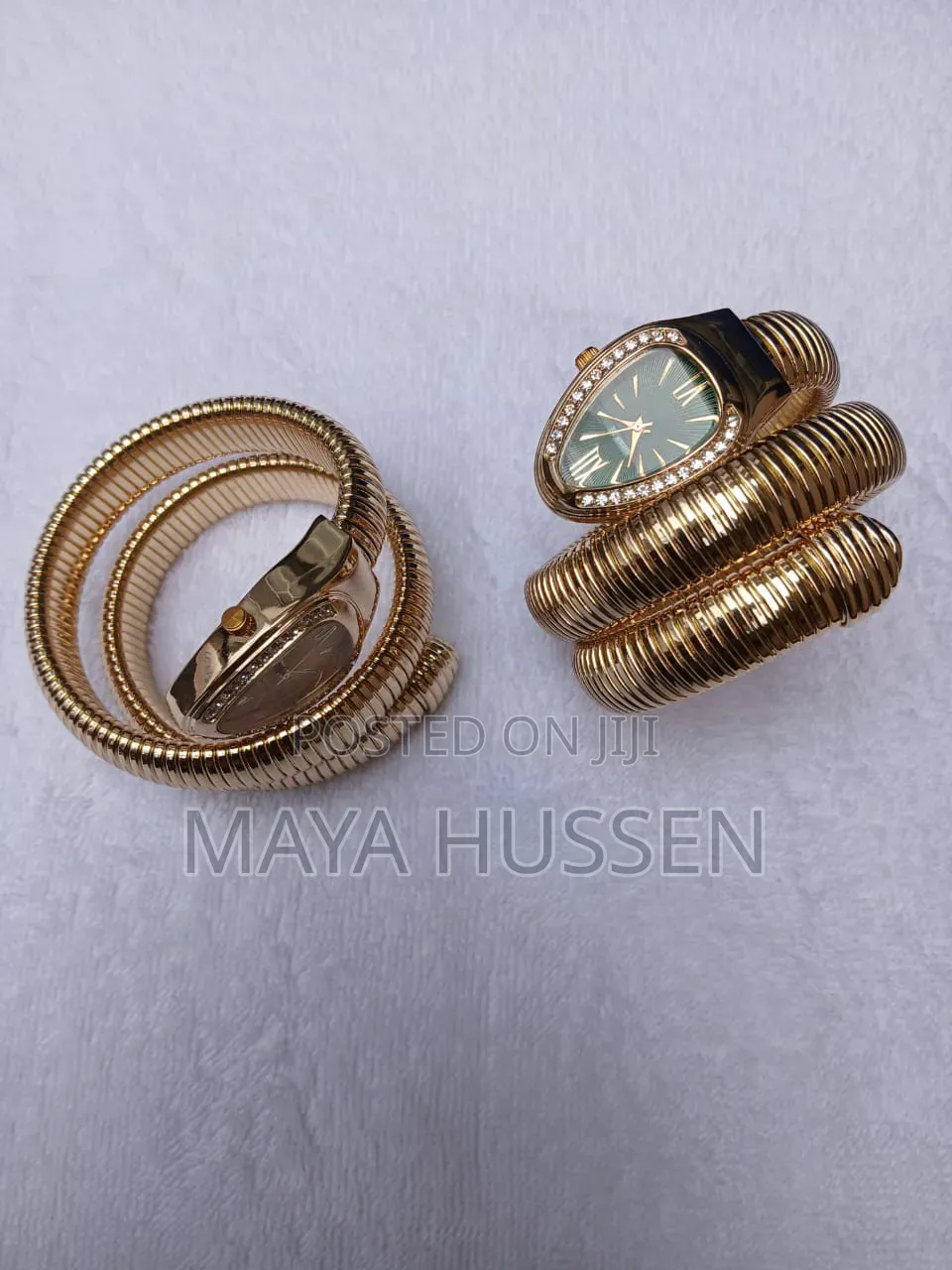 Snake Coil Gold Watch With Crystal Bezel
3. Description (መግለጫ)