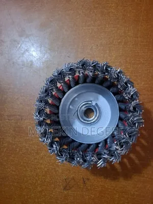 A Twisted Wire Cup Brush With a Red Protective Cover and Threaded