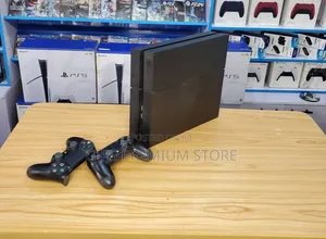  PS4 Fat ከ 2 ኦሪጅናል ጆይስቲክ እና ጌሞች ጋር