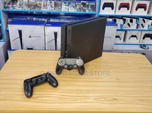  PS4 Fat ከ 2 ኦሪጅናል ጆይስቲክ እና ጌሞች ጋር
