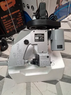 የማዳበሪያ መስፍያ ማሽን (Sewing Machine)