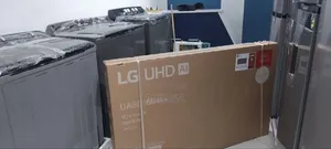 LG UHD 65inc መዝናኛዎን በሚያስደንቅ የ4K ጥራት ያሻሽሉ! ለፊልም ምሽቶች , ለስፖርት ጨዋታዎች 