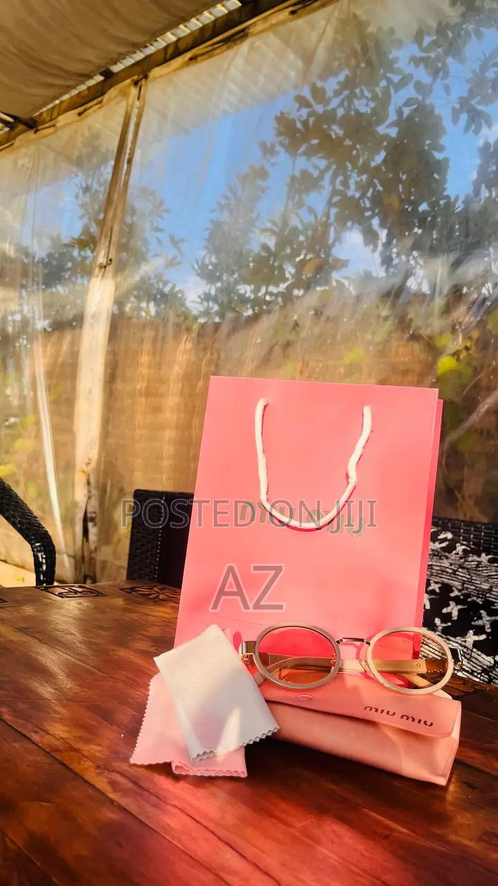 Miu Miu Oval Metal Sunglasses