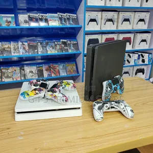  ያልተፈታ PS4 Slim ከ FC 26 እና 2 ኮንትሮለር ጋር