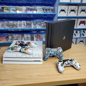 ያልተፈታ PS4 Pro ከ FC 26 እና 2 ኮንትሮለር ጋር