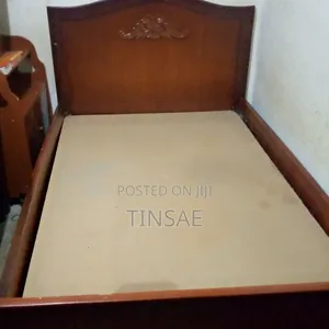 1.2 M Wooden Bed