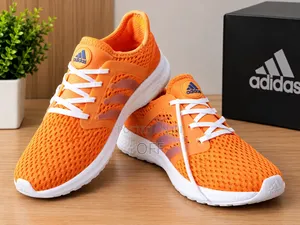 የሞያሌ ቶርሽን Unisex ኦሬንጅ ስፖርት ስኒከር – በጥሩ ሁኔታ