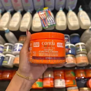 ​Cantu Shea Butter Coconut Curling Cream (ኦሪጅናል) ፍሪዝ ማረጊያ ክሬም