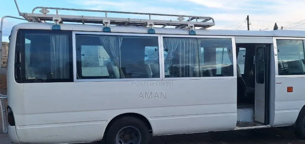 Toyota Coaster 2011 White