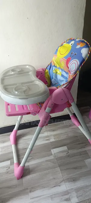 High Chair / የልጆች መመገቢያ