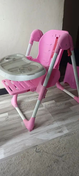 High Chair / የልጆች መመገቢያ