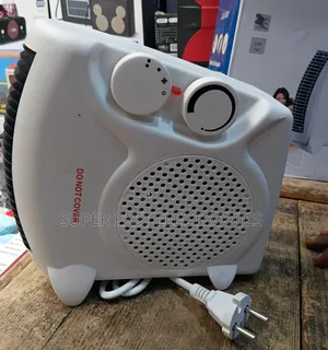 Compact Portable Electric Fan Heater With Adjustable Thermostat