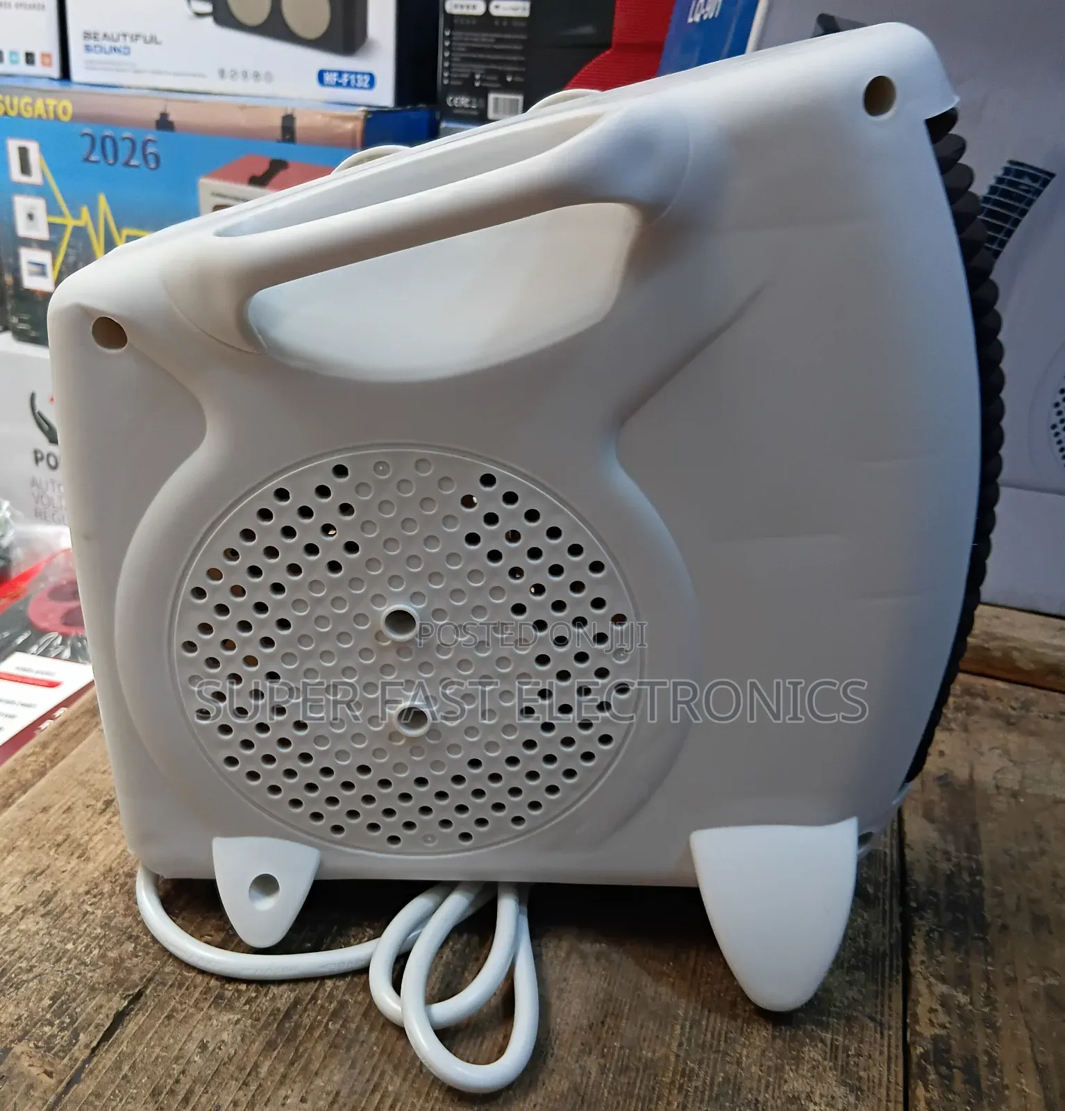 Compact Portable Electric Fan Heater With Adjustable Thermostat