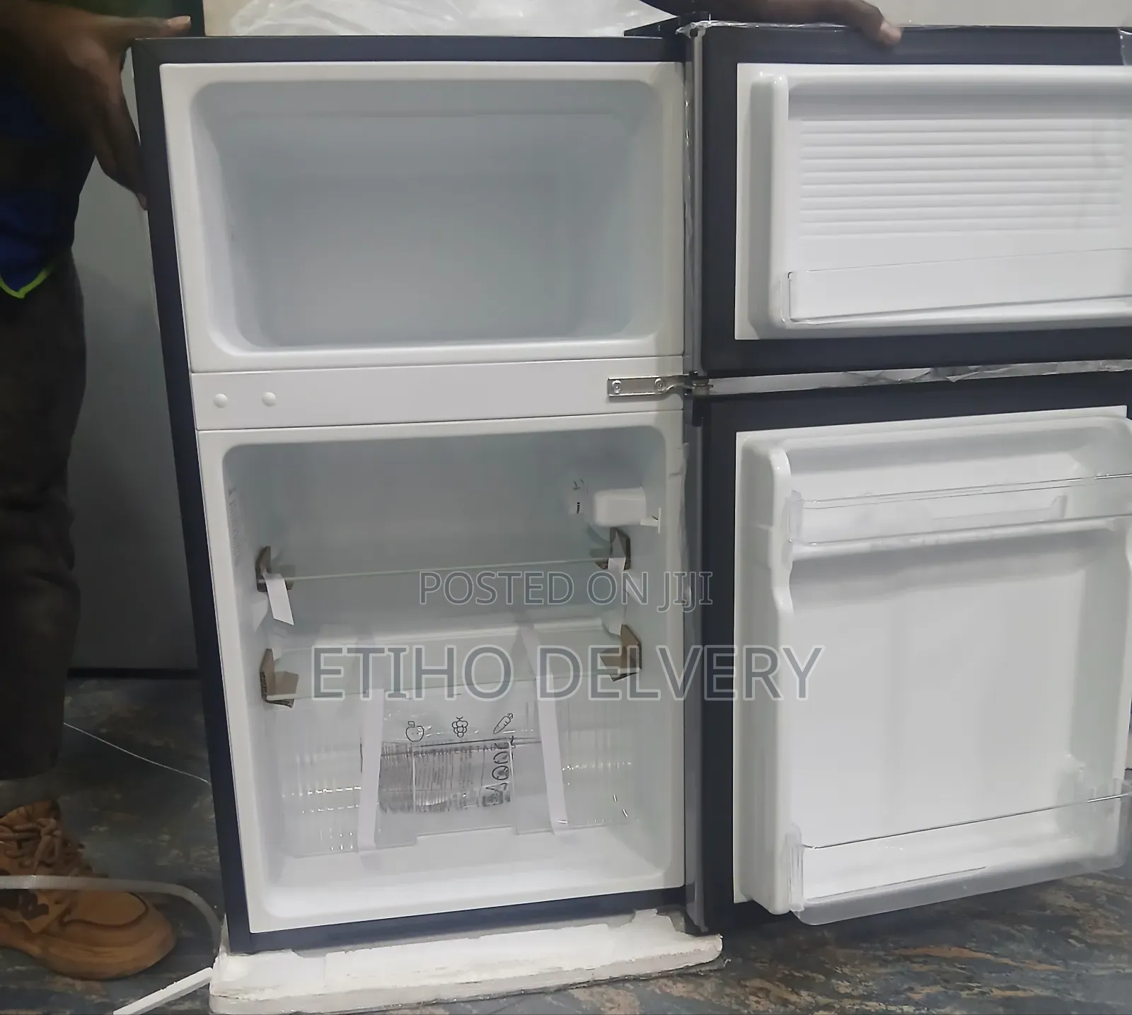 The Image Shows a Silver Midea Top Freezer Series Compact Refrigerator