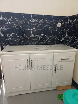 Bed, Dressing Table and Kitchen Cabnet