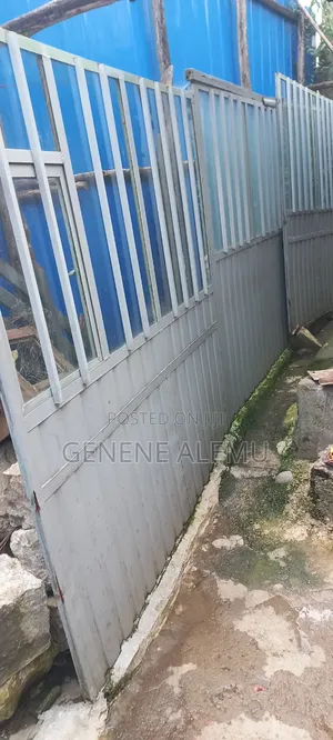 የላሜራ ብረት ከነመስታወቱ
