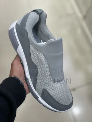 Lightweight Gray Dlip-on Casual Shoe Featuring a Breathable Mesh Upper