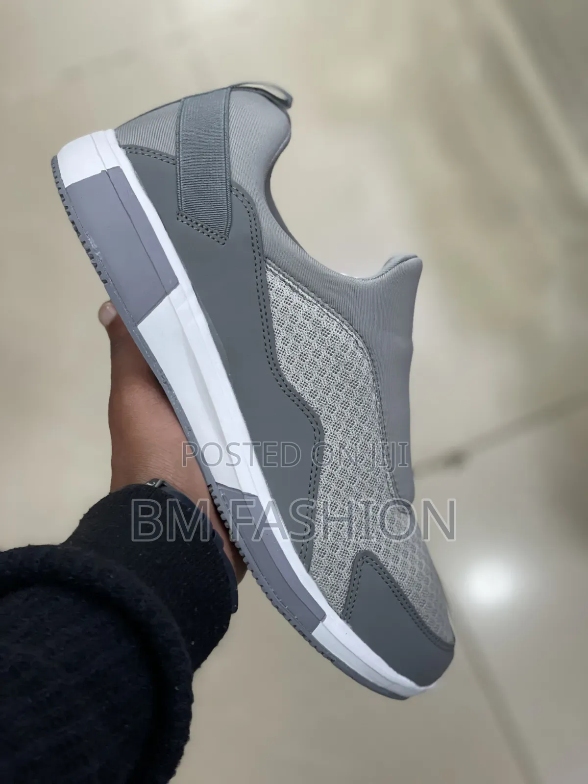 Lightweight Gray Dlip-on Casual Shoe Featuring a Breathable Mesh Upper