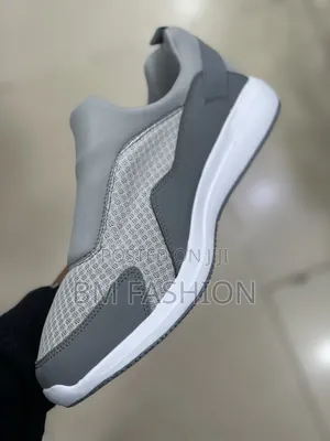 Lightweight Gray Dlip-on Casual Shoe Featuring a Breathable Mesh Upper