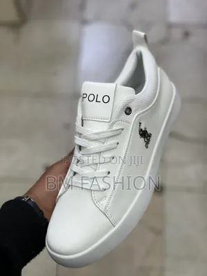 White U.S. Polo Assn. Sneaker Featuring a Contrasting Black Polo Logo