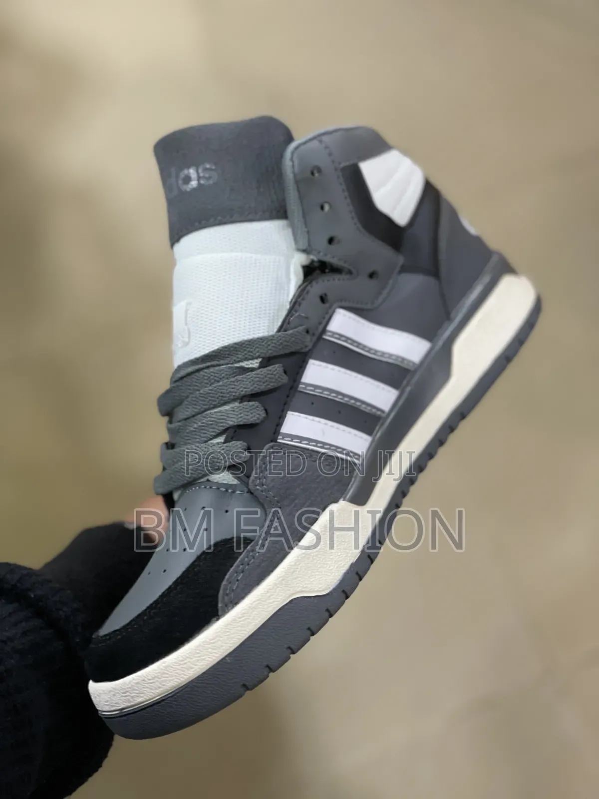Adidas Entrap Mid in a Grey, Black, and White Colorway.