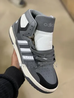 Adidas Entrap Mid in a Grey, Black, and White Colorway.