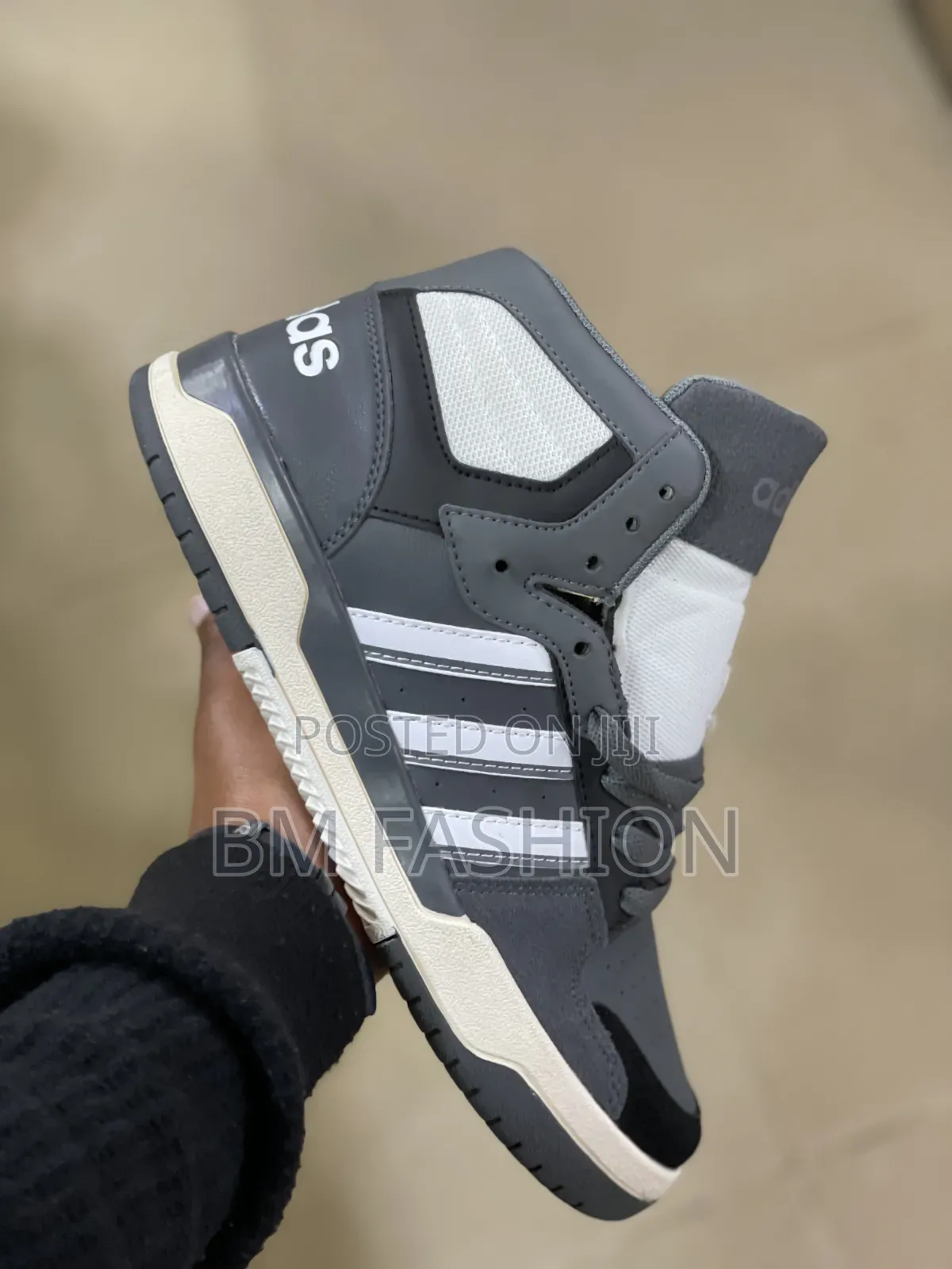 Adidas Entrap Mid in a Grey, Black, and White Colorway.