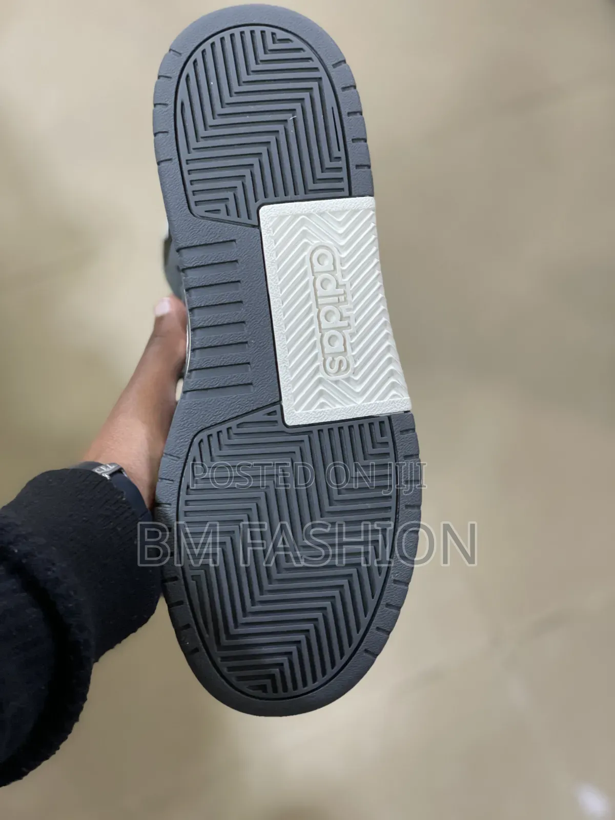 Adidas Entrap Mid in a Grey, Black, and White Colorway.