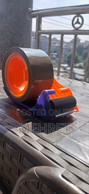 Tape Cutter (የፕላስተር መቁረጫ)