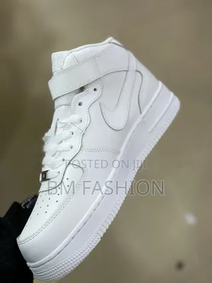 Nike Air Force 1 Mid-Top, Featuring an Ankle Strap and Leather Upper