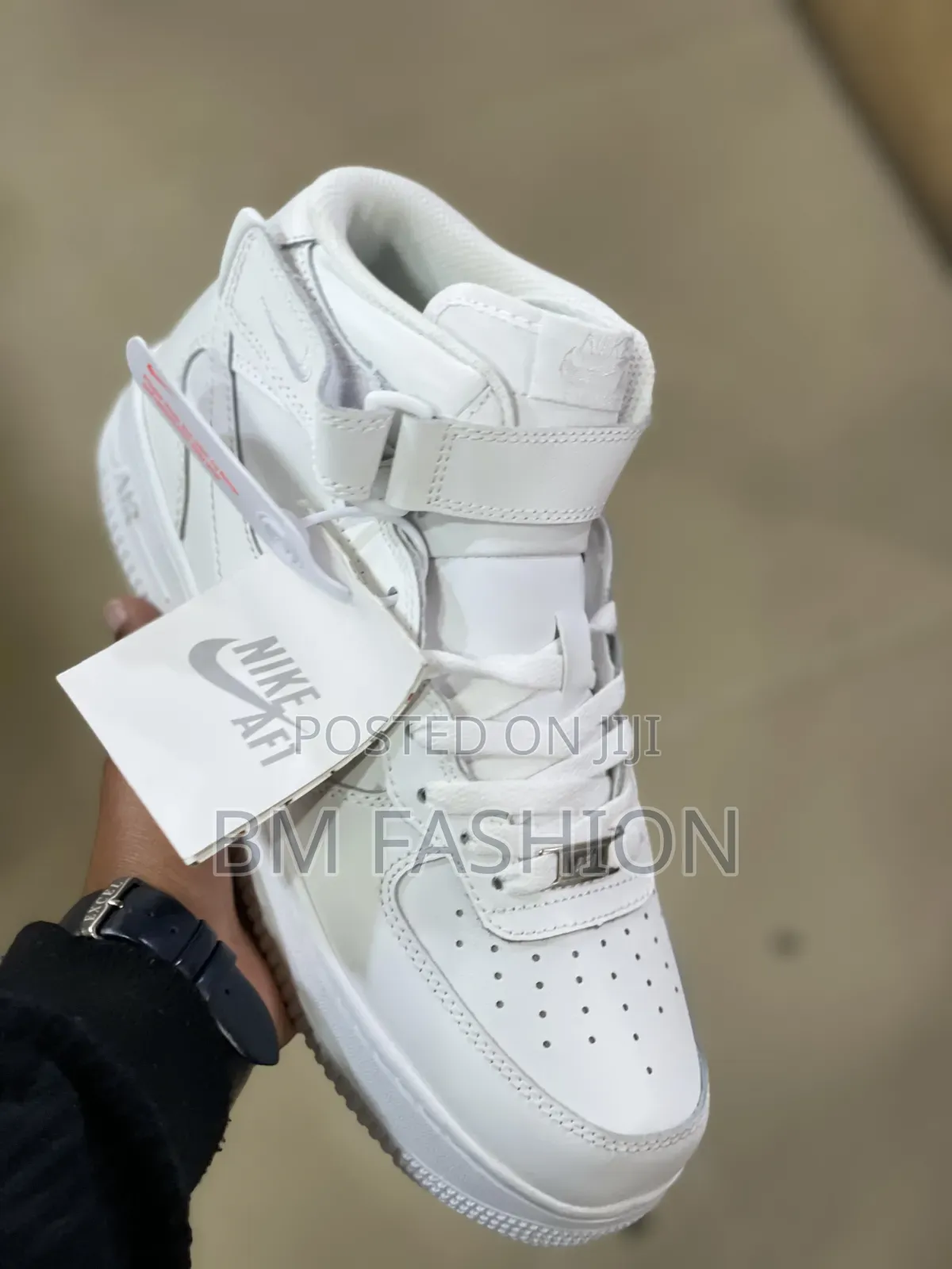 Nike Air Force 1 Mid-Top, Featuring an Ankle Strap and Leather Upper